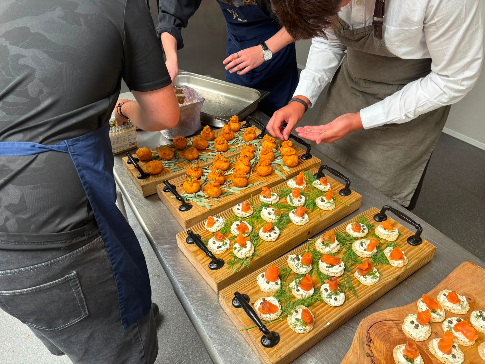 Event food being carefully prepared and presented by a professional catering team